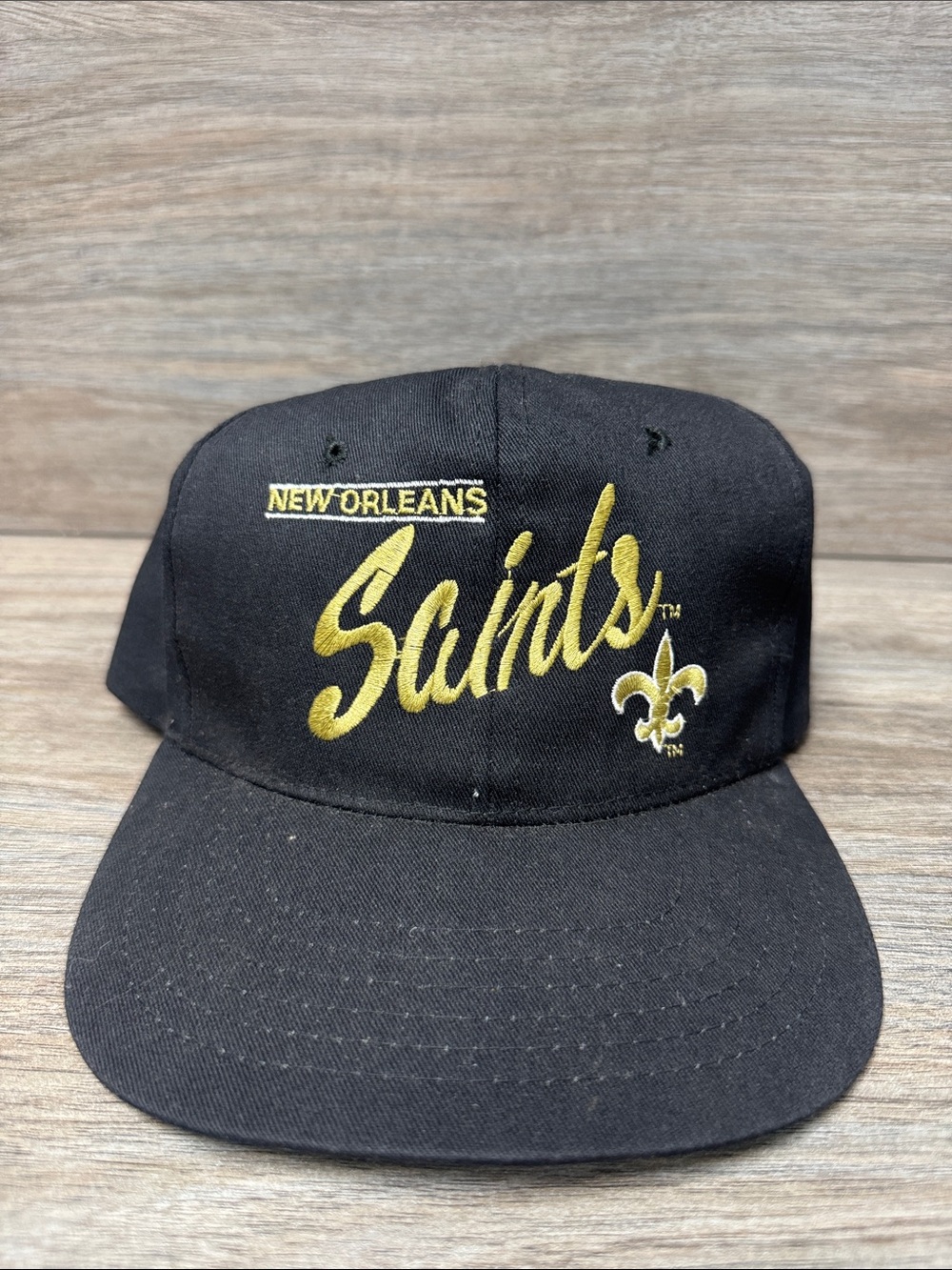 NFL New Orleans Saints Black and Gold Script Snapback Hat